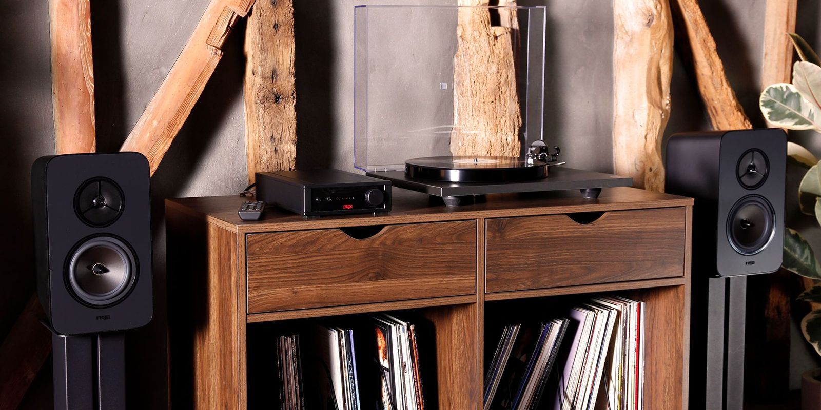 The Rega System One the ultimate audio experience Hi-Fi System surounding shelf of vinyl records