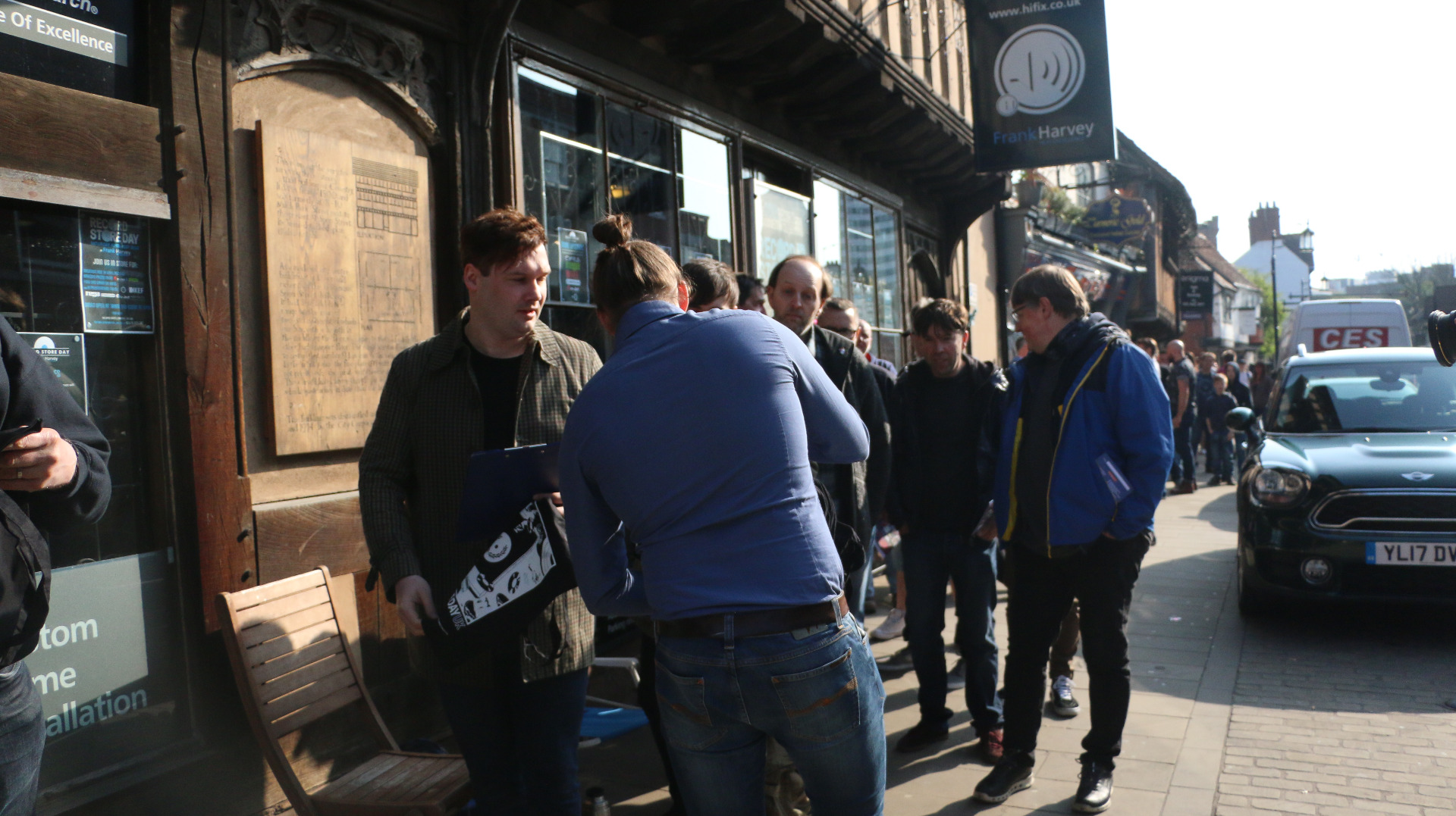 People gathered outside Hifix talking about the new record store day album releases